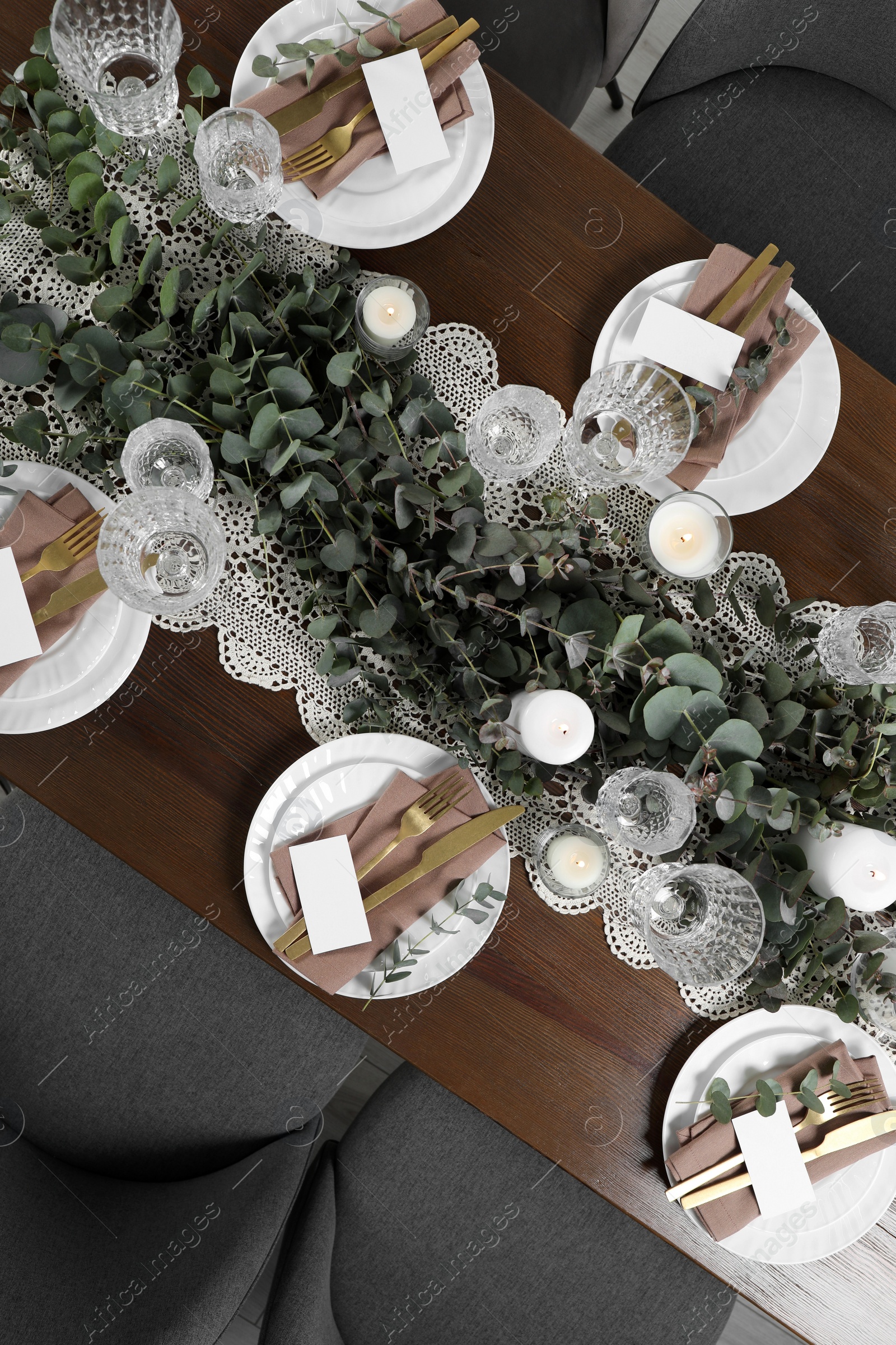 Photo of Luxury table setting with beautiful decor and blank cards, flat lay. Festive dinner