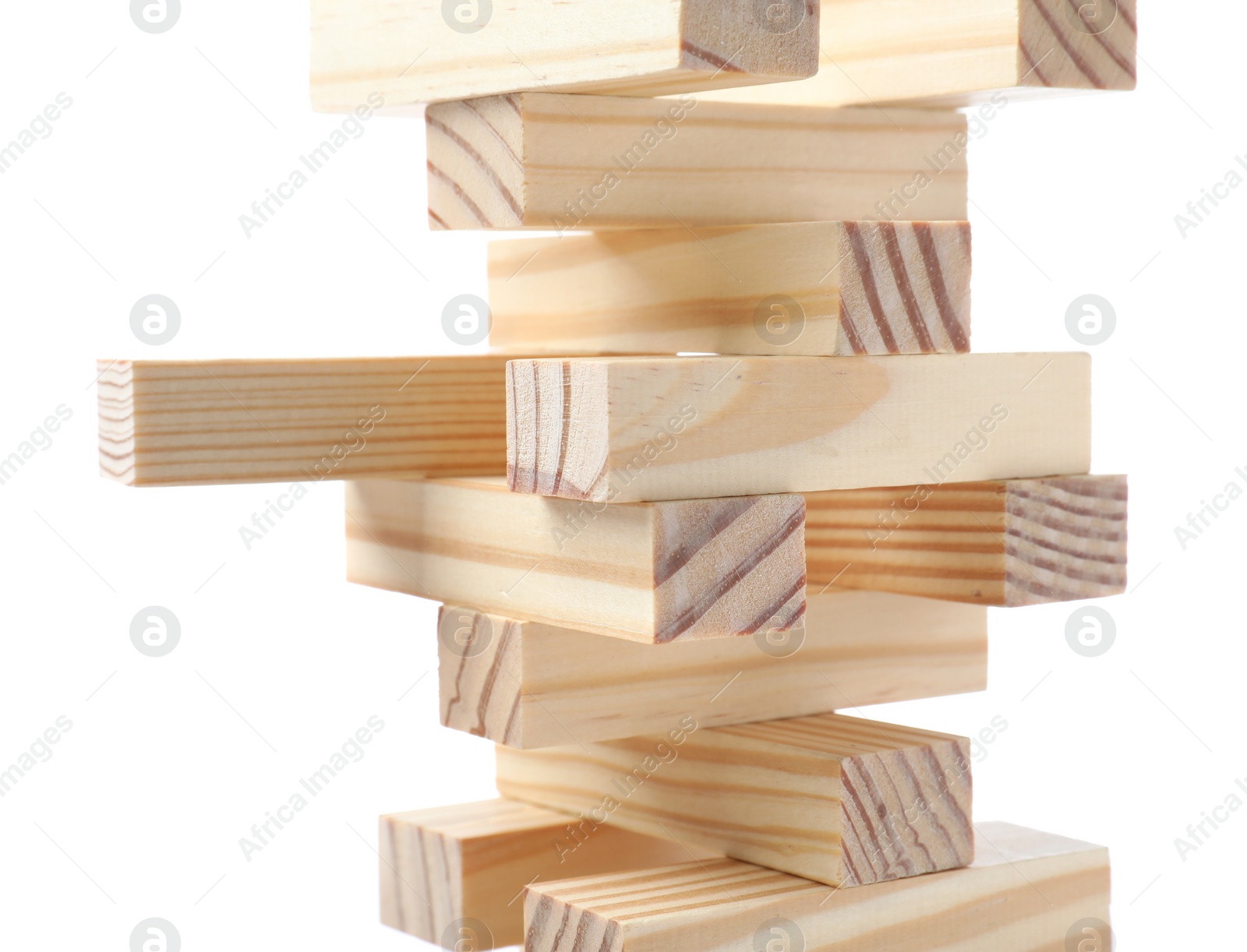 Photo of Jenga tower made of wooden blocks on white background