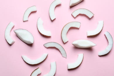 Photo of Coconut pieces on color background