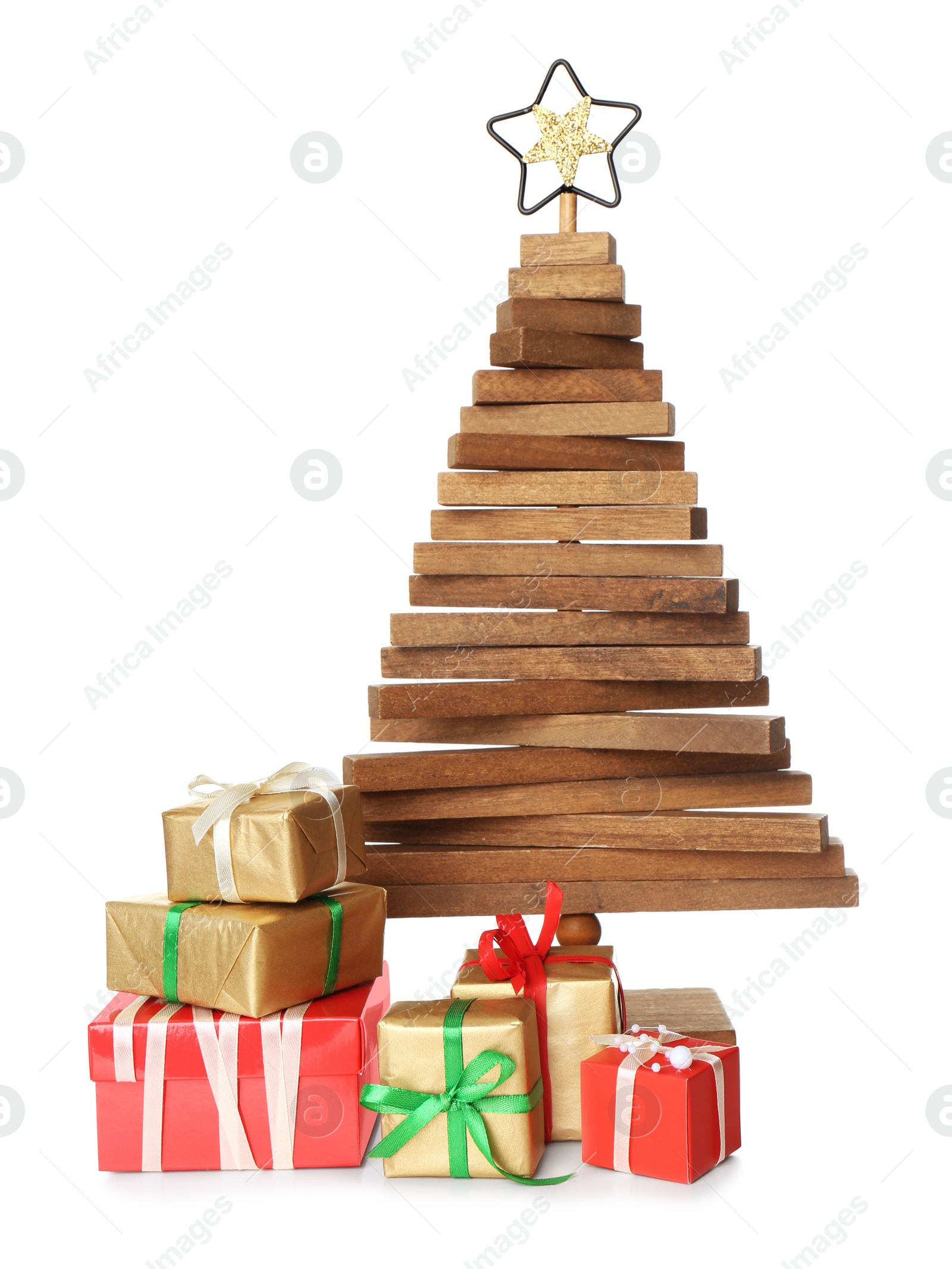 Photo of Decorative wooden Christmas tree with gift boxes on white background