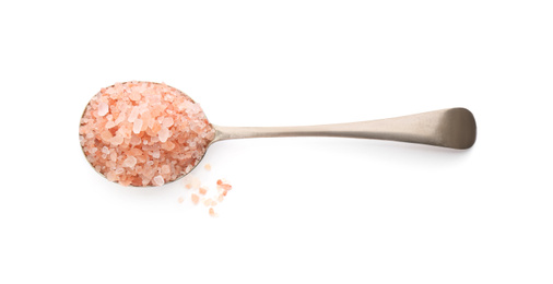 Photo of Metal spoon with pink himalayan salt isolated on white, top view