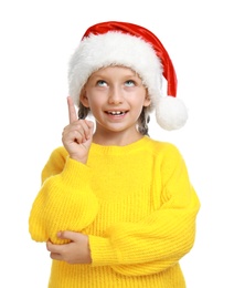 Photo of Happy little child in Santa hat on white background. Christmas celebration