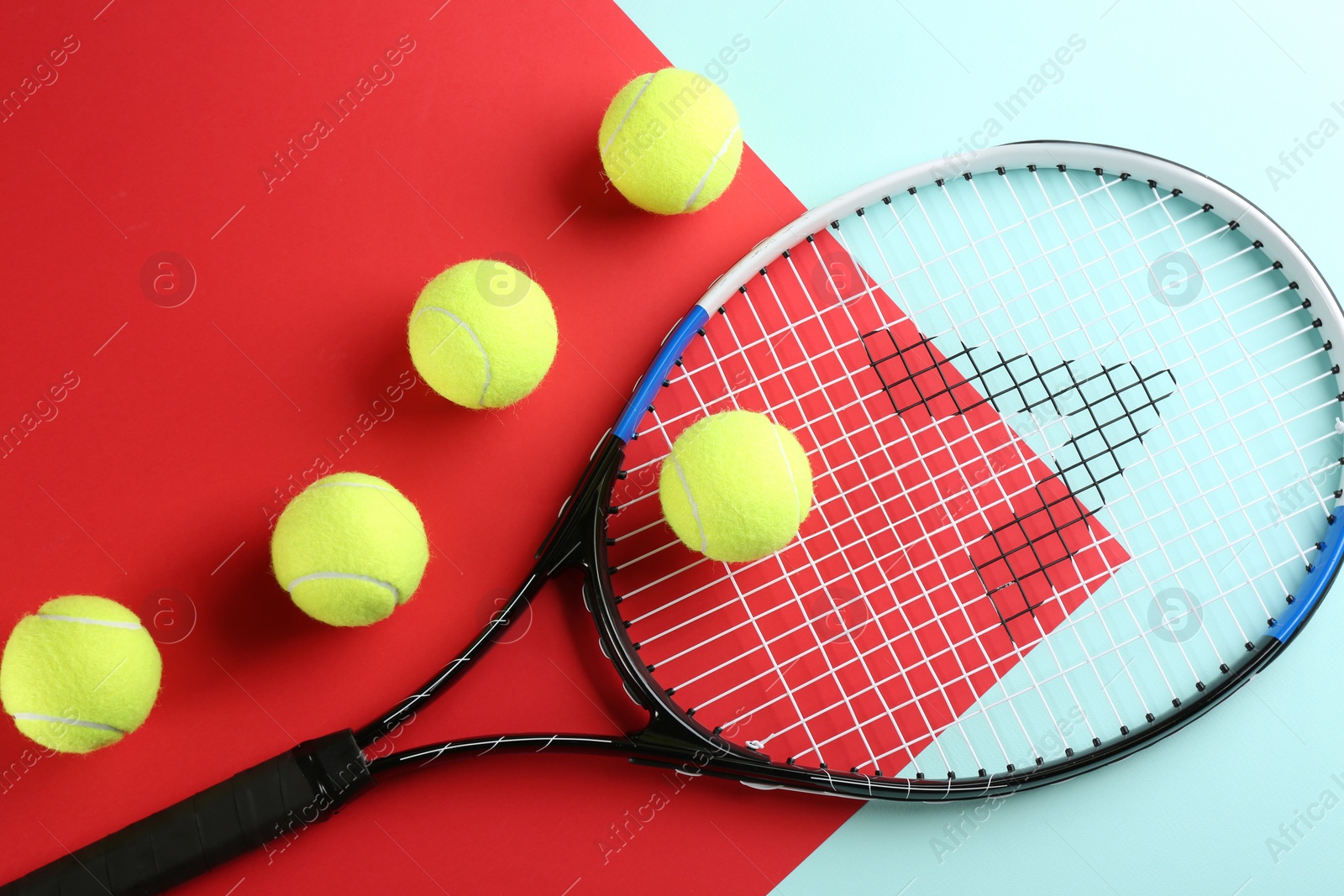 Photo of Tennis racket and balls on color background, flat lay. Sports equipment