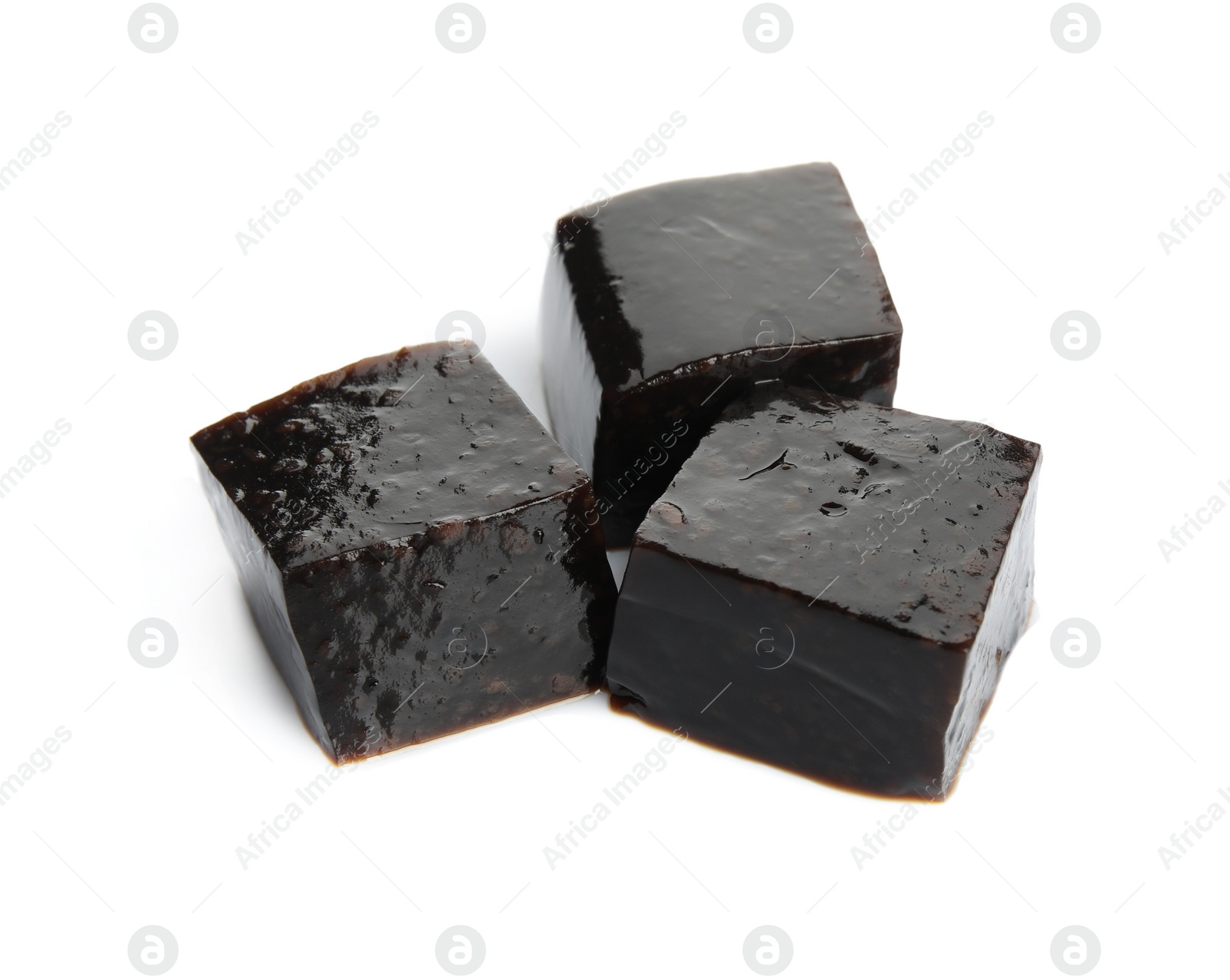 Photo of Delicious grass jelly cubes on white background