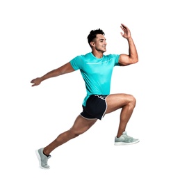 Handsome young man running on white background