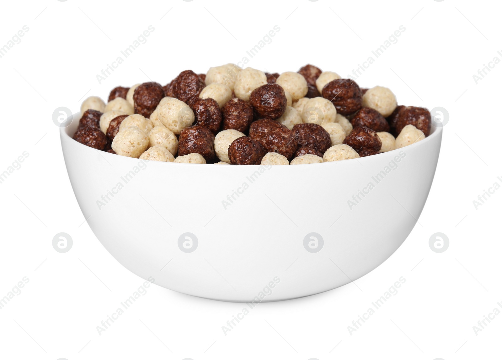 Photo of Tasty sweet cereal balls in bowl isolated on white