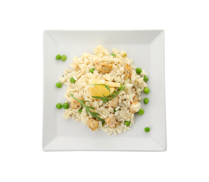 Photo of Delicious chicken risotto and lemon slices isolated on white, top view