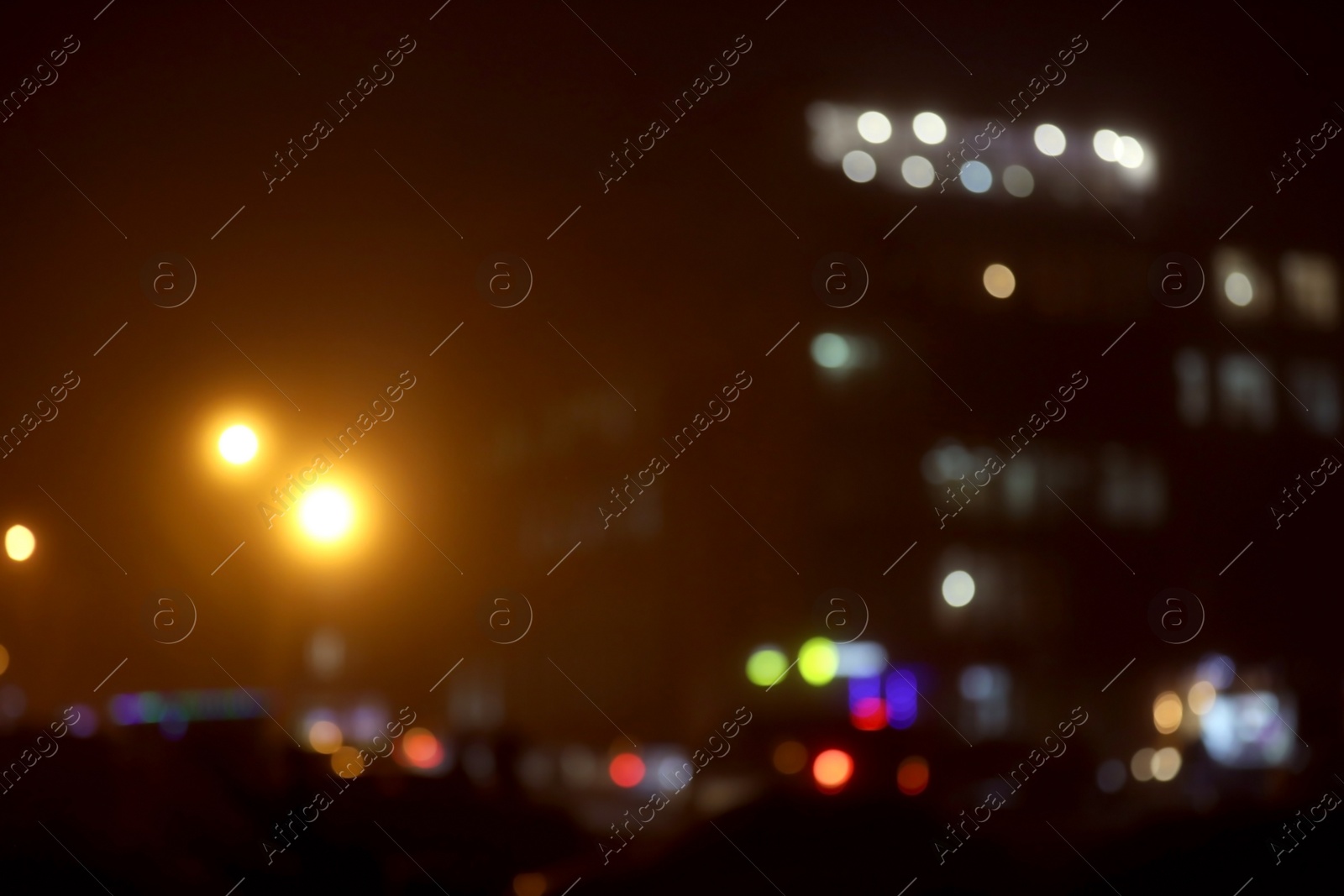 Photo of Blurred view of night city. Bokeh effect