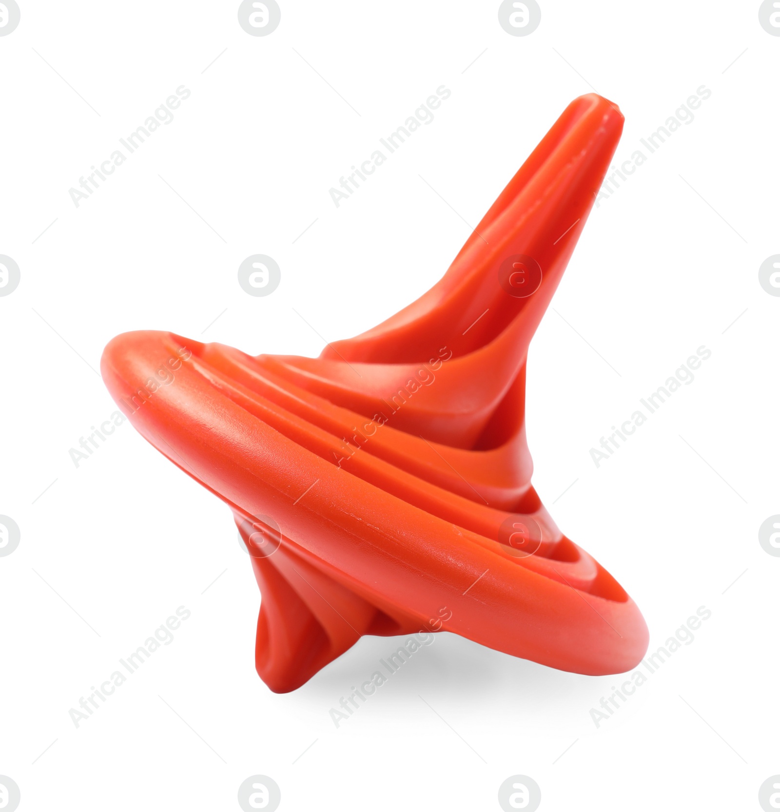 Photo of One orange spinning top on white background