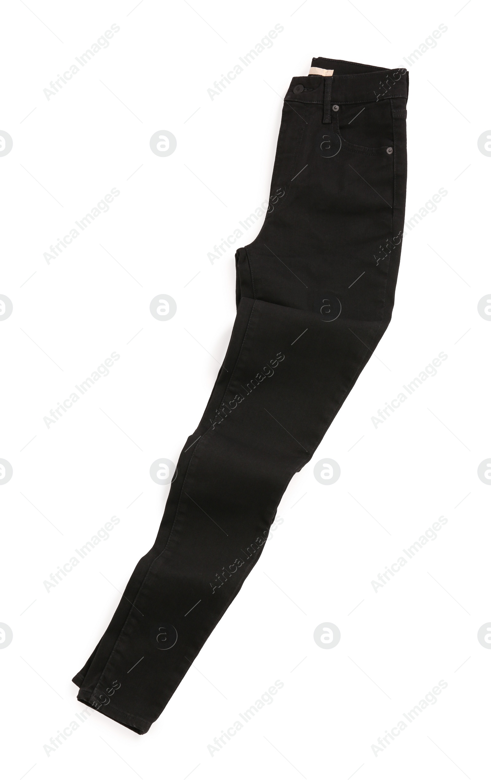 Photo of Stylish black jeans isolated on white, top view