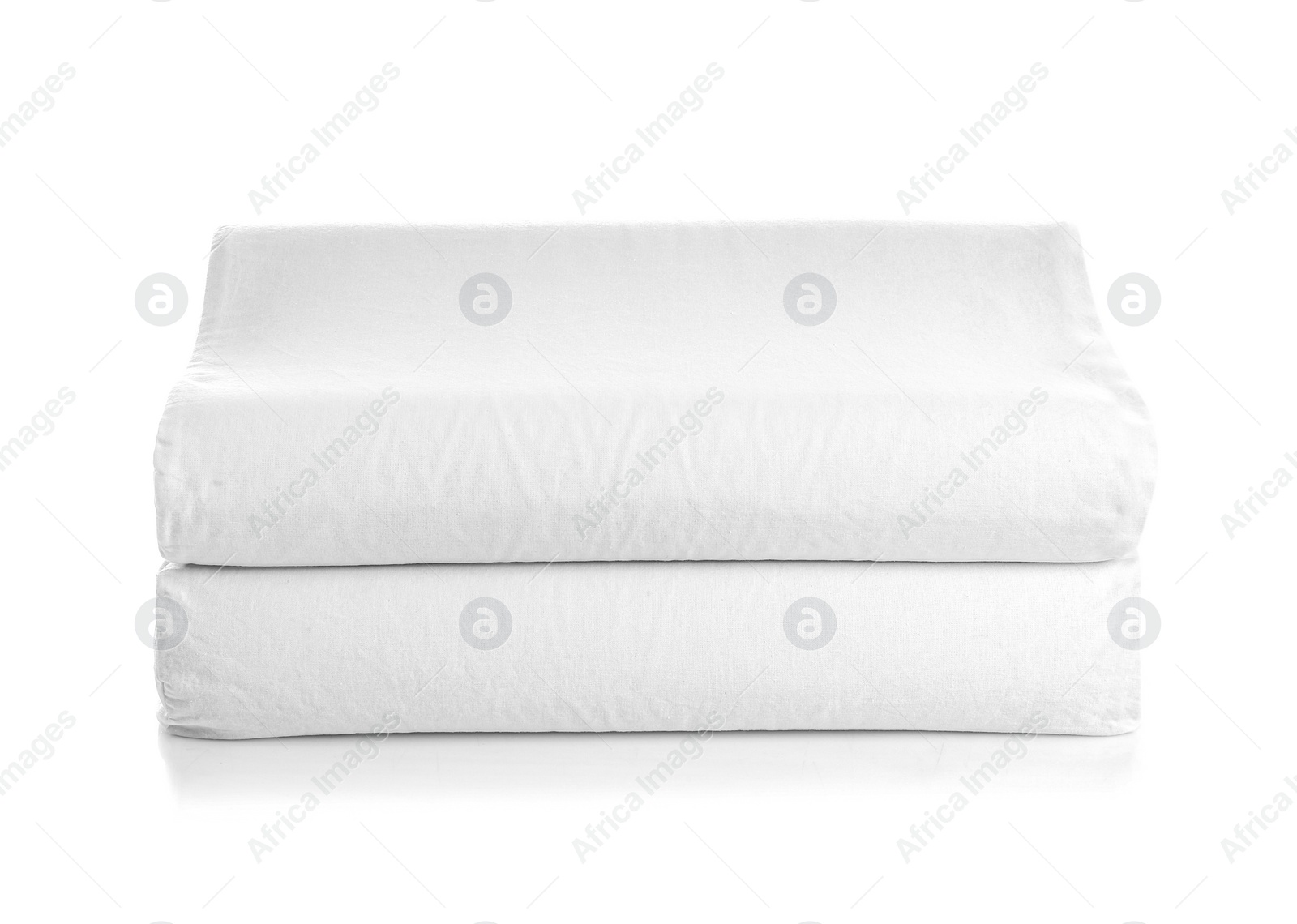 Photo of Clean soft orthopedic pillows on white background