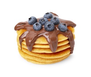 Photo of Stack of tasty pancakes with chocolate spread and blueberries isolated on white