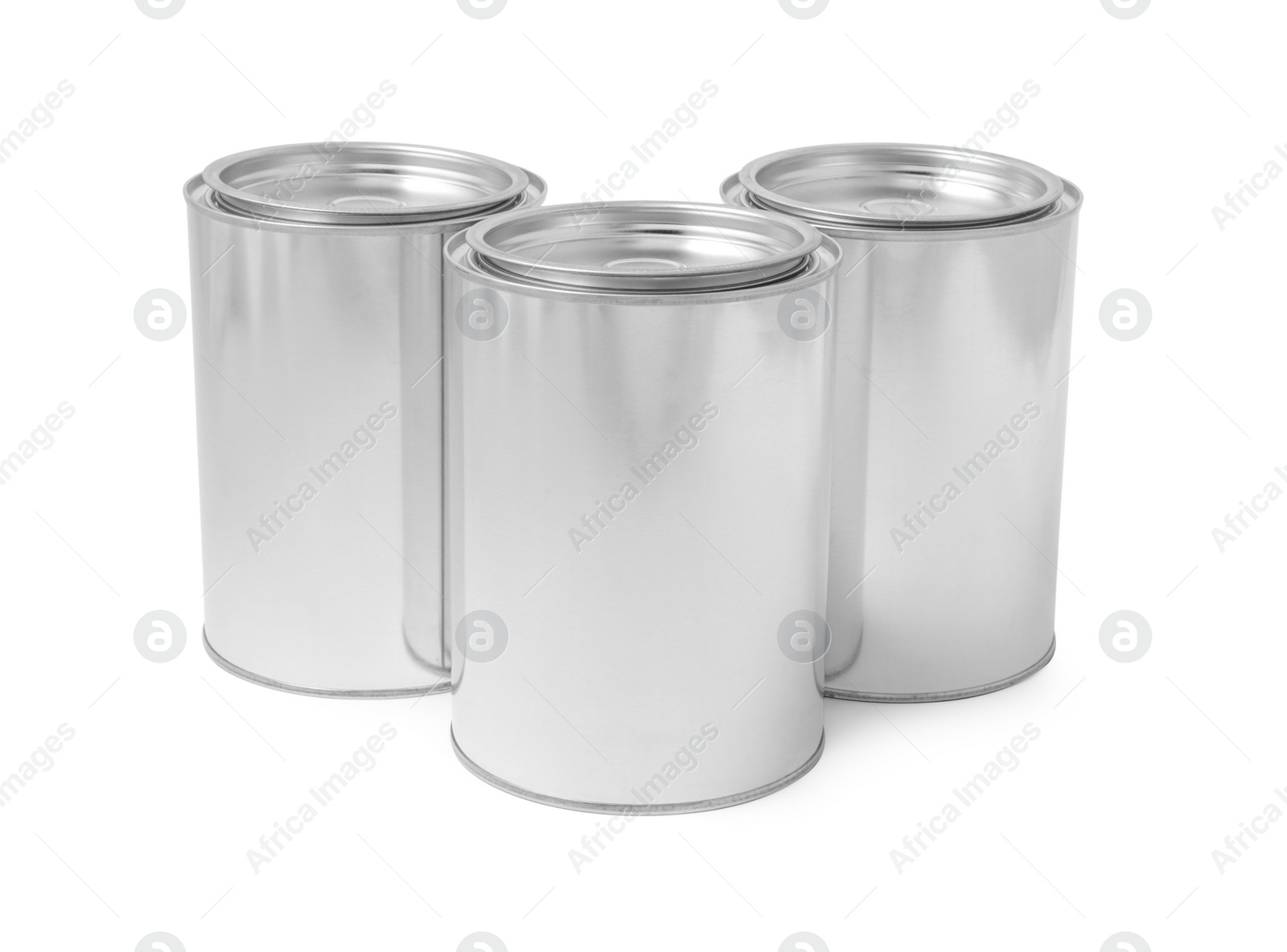 Photo of Many cans of paints on white background