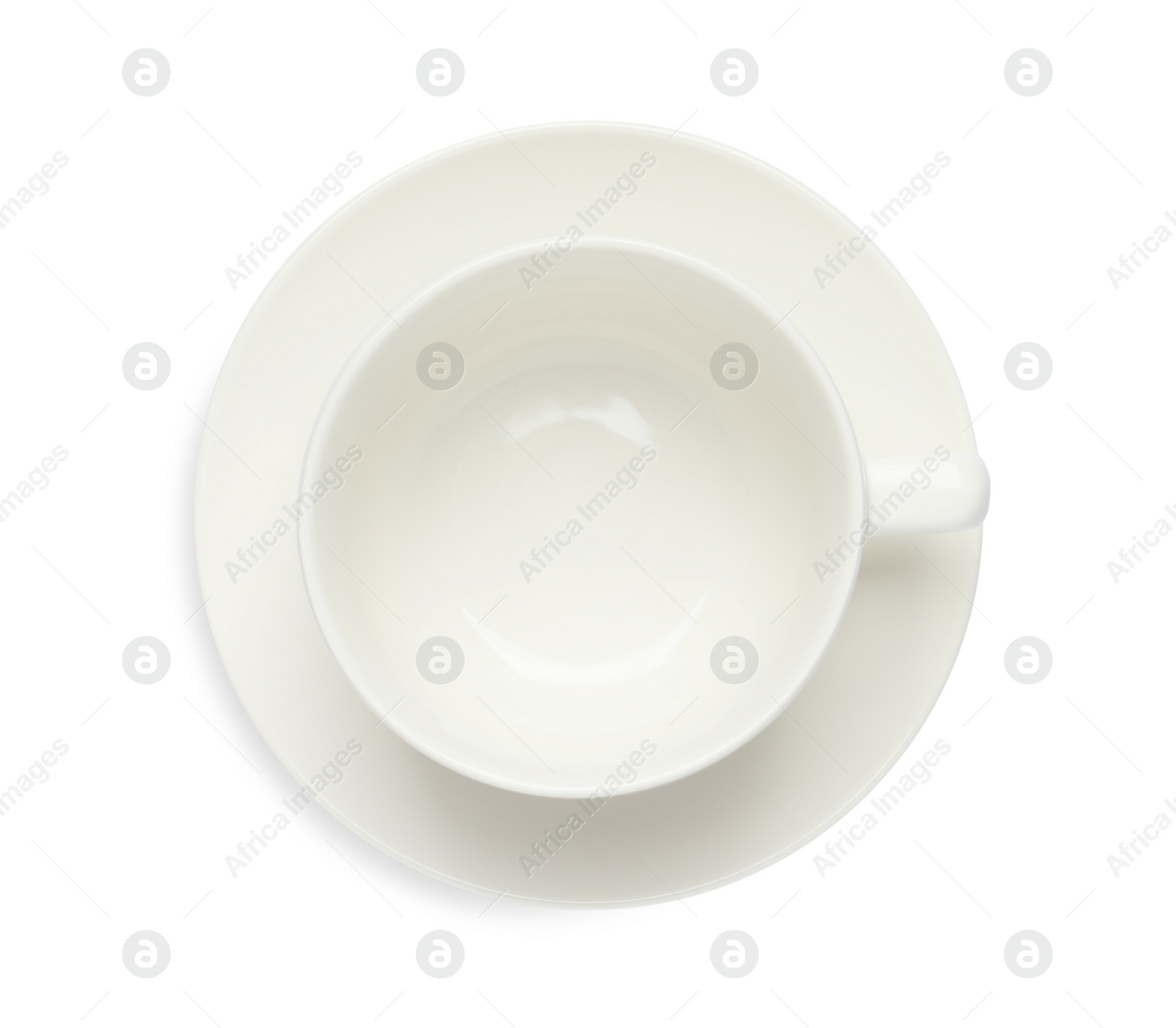 Photo of Empty ceramic cup isolated on white, top view