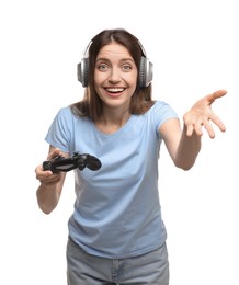 Happy woman in headphones with game controller on white background