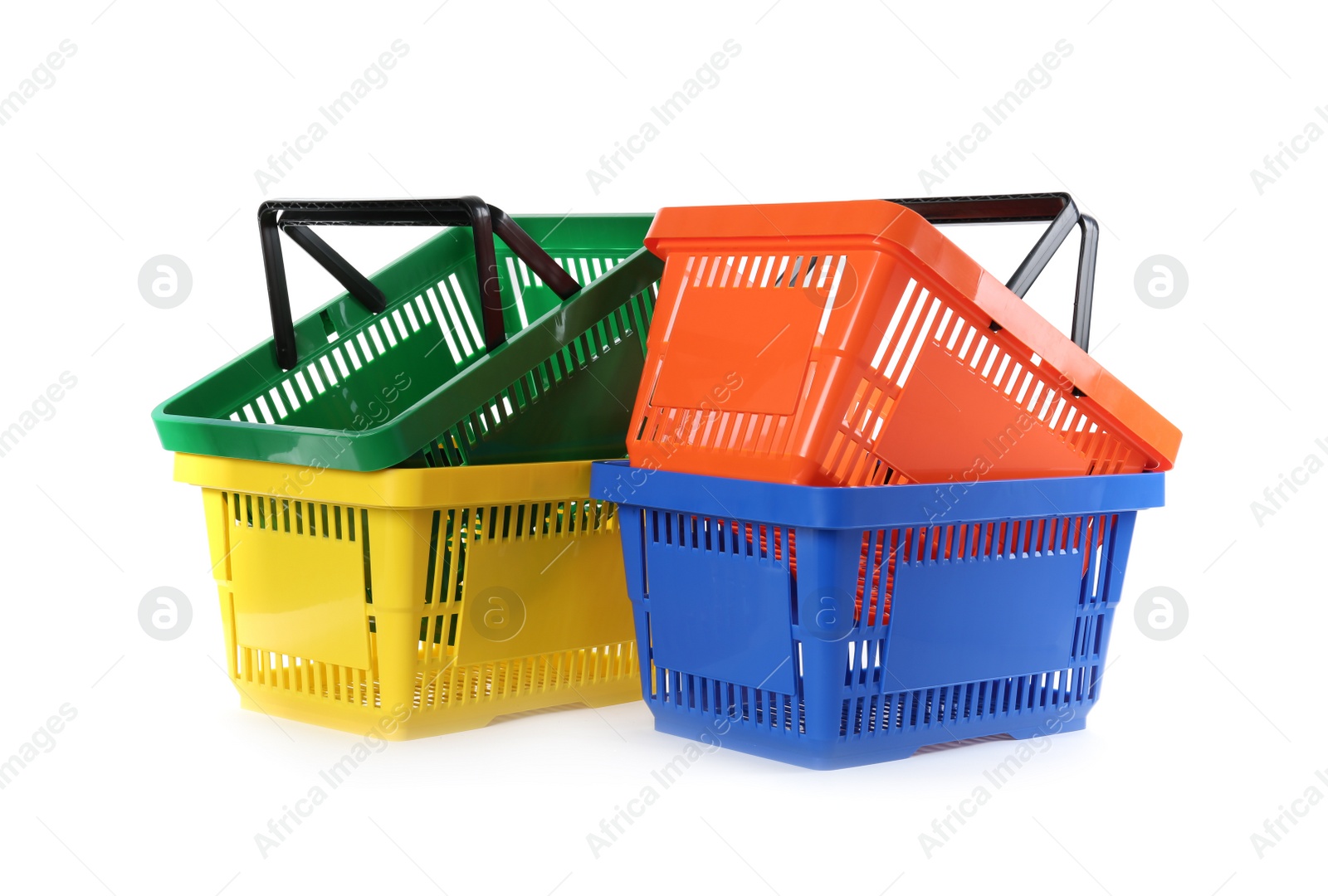 Photo of Colorful plastic shopping baskets on white background