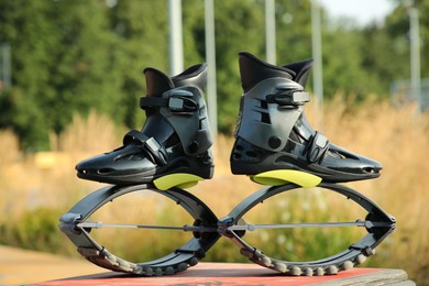 Stylish kangoo jumping boots in workout park