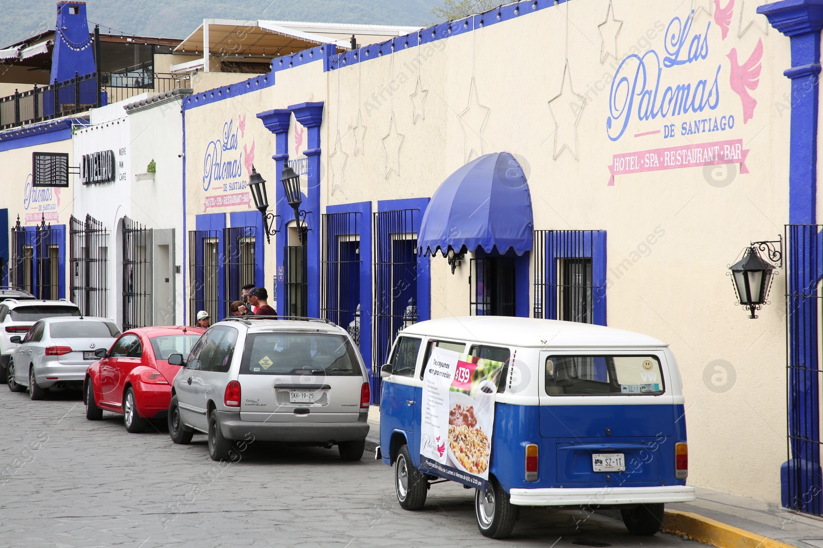 Photo of San Pedro Garza Garcia, Mexico – February 8, 2023: View on street with parked cars and beautiful buildings