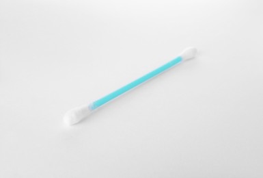 Clean cotton bud isolated on white. Hygienic accessory