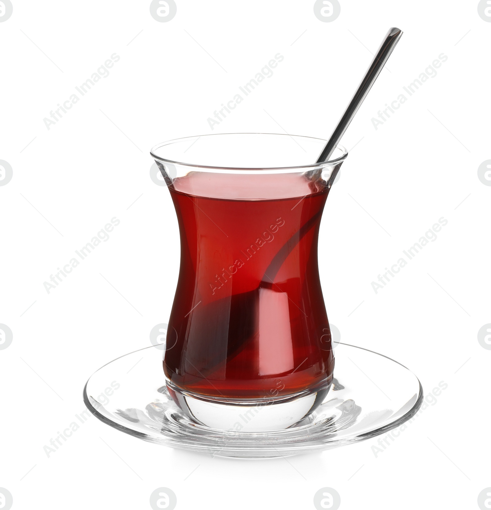 Photo of Glass with traditional Turkish tea isolated on white