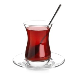 Photo of Glass with traditional Turkish tea isolated on white