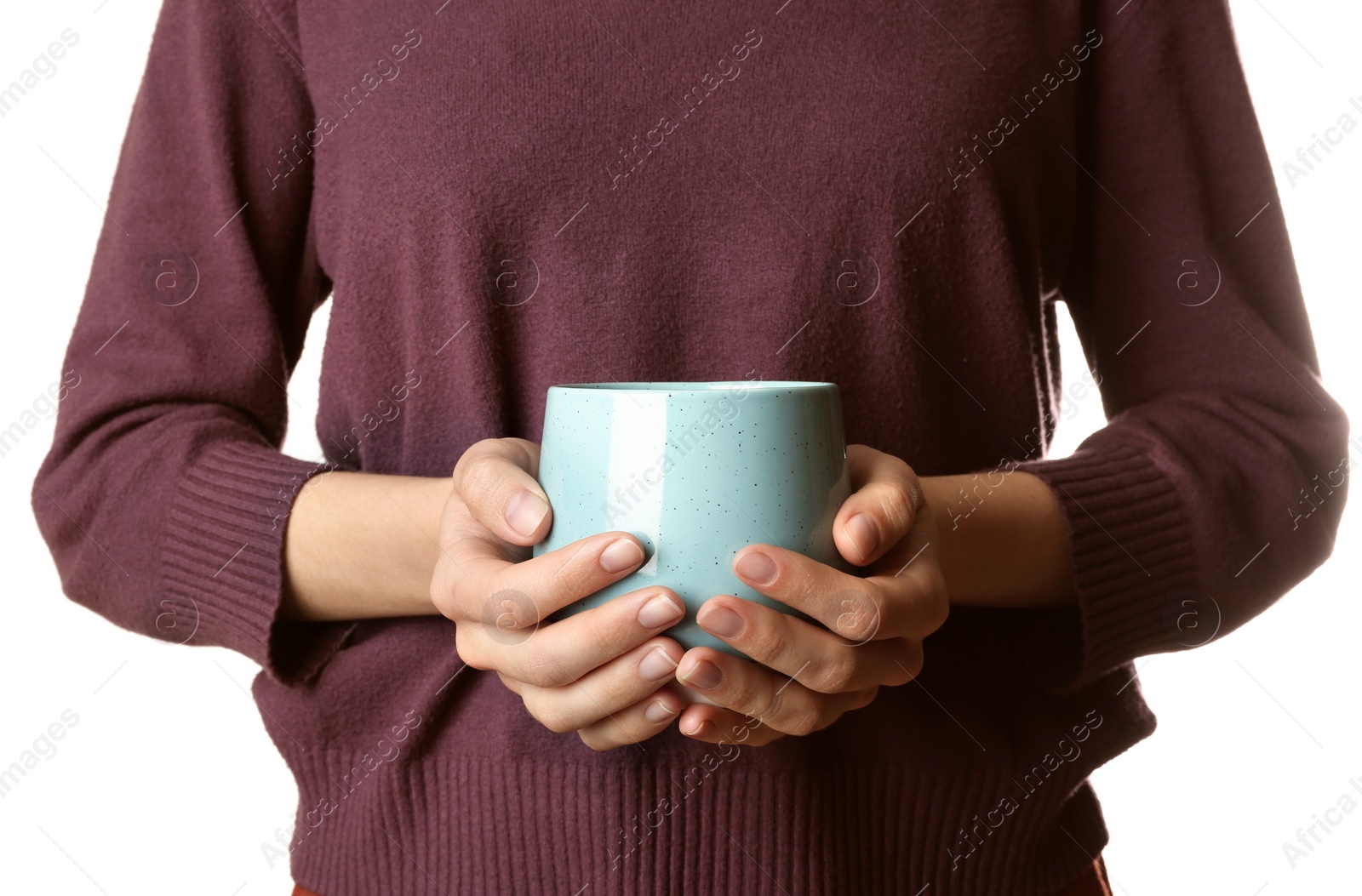 Photo of Woman holding ceramic cup on white background, closeup