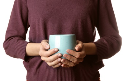 Photo of Woman holding ceramic cup on white background, closeup