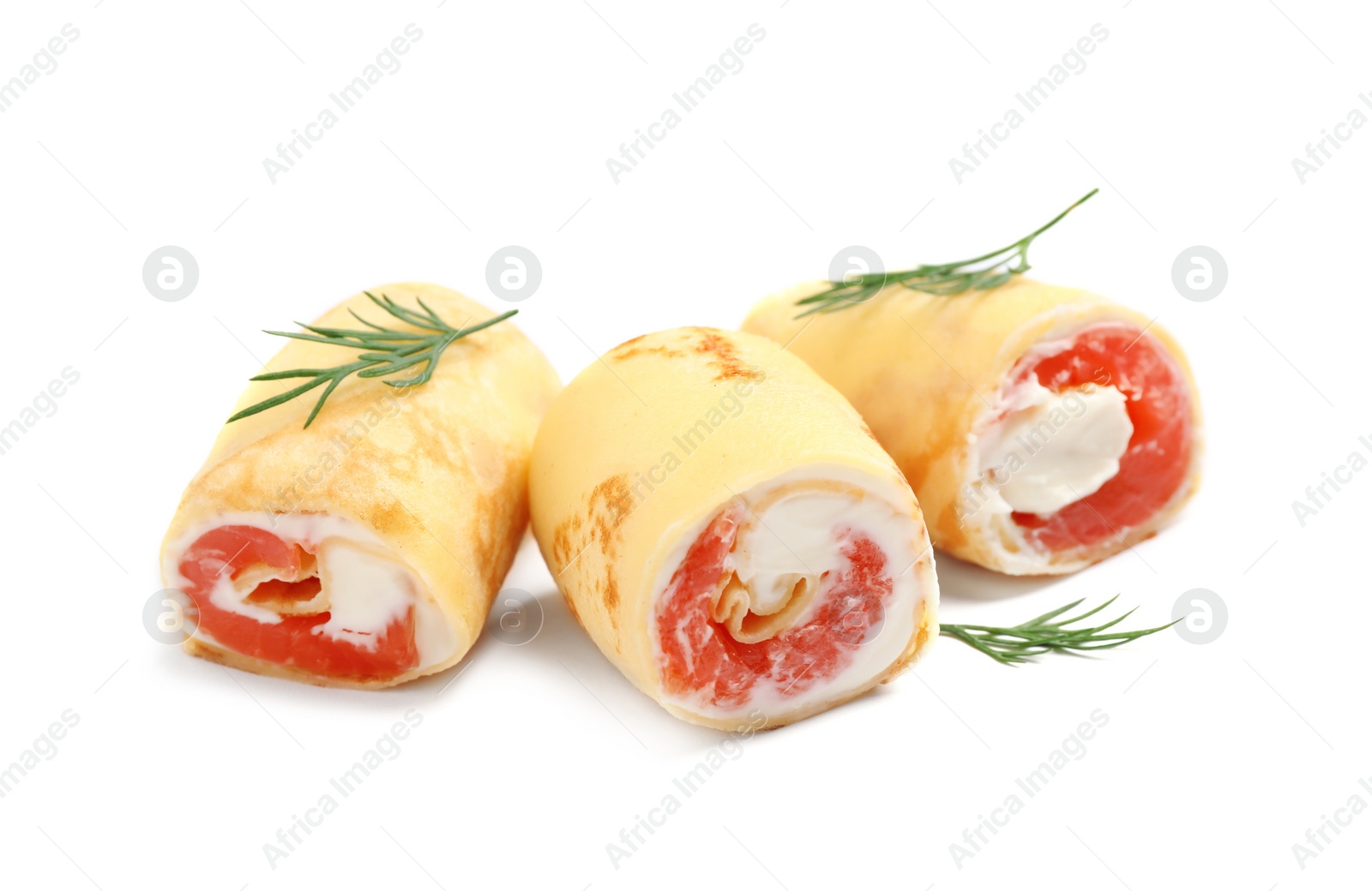 Photo of Delicious thin pancakes with salmon and cream cheese on white background