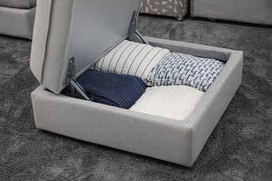Open modular sofa section with storage in room