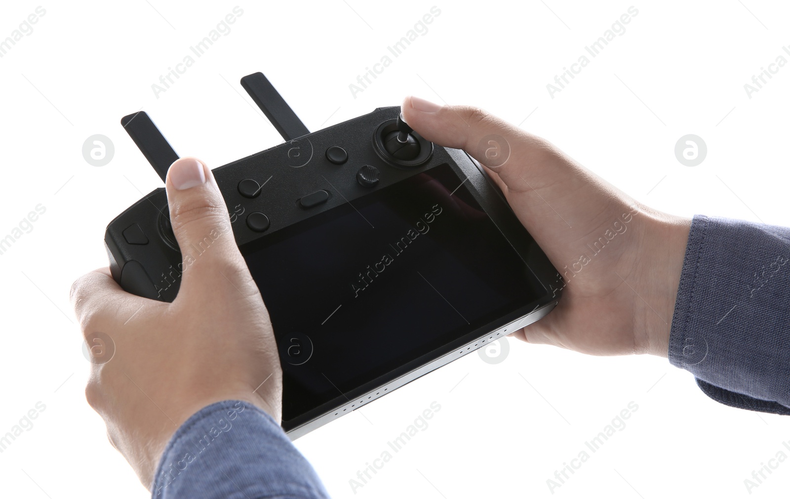 Photo of Man holding new modern drone controller on white background, closeup of hands