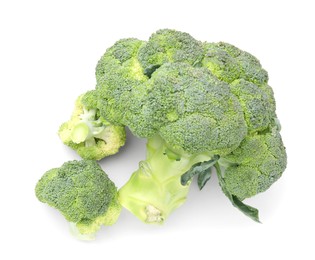 Photo of Fresh raw green broccoli isolated on white, top view