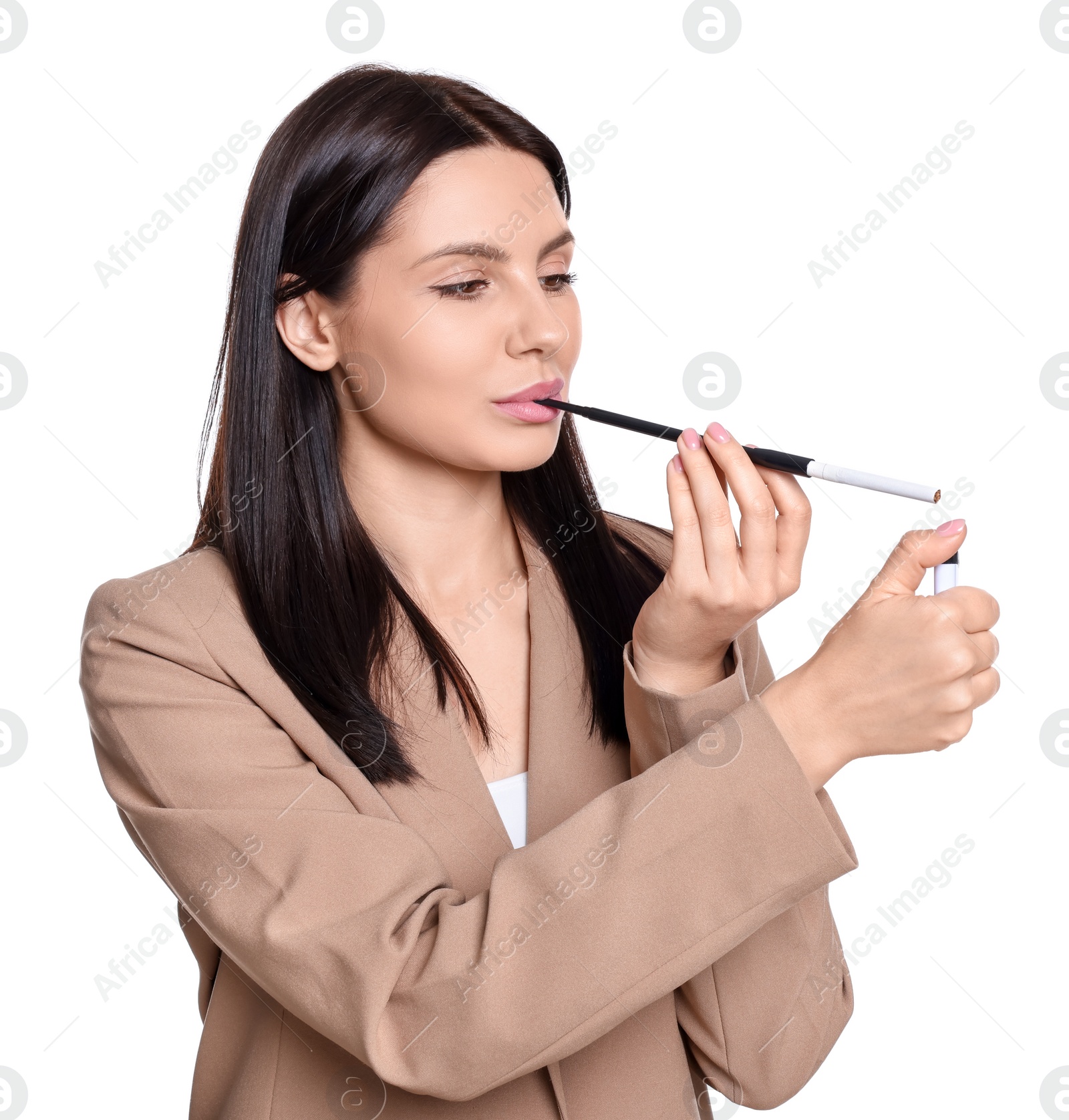 Photo of Woman using long cigarette holder for smoking isolated on white