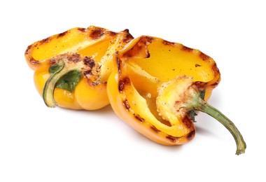 Photo of Halves of grilled yellow bell pepper isolated on white