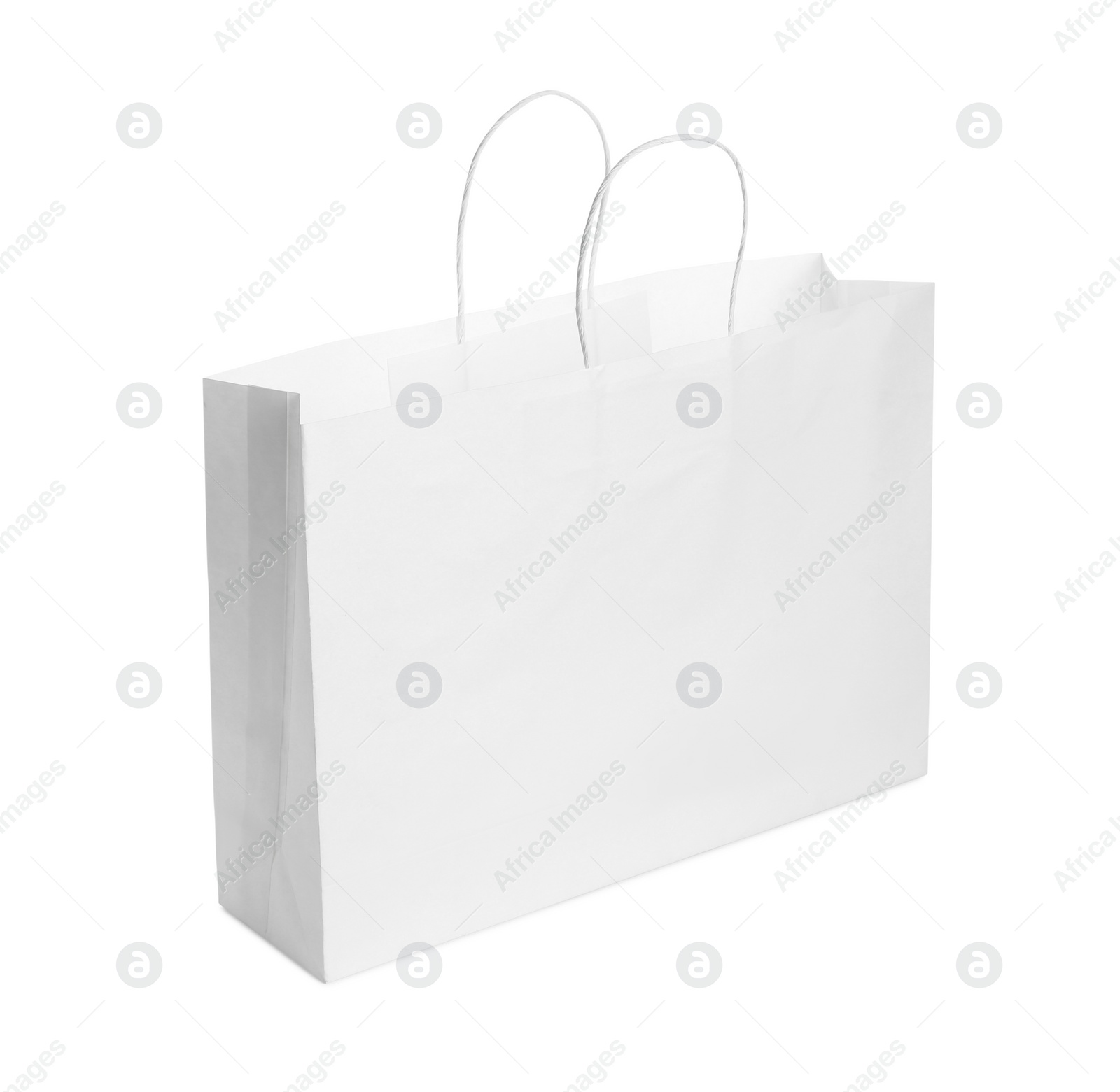 Photo of One paper bag isolated on white. Mockup for design