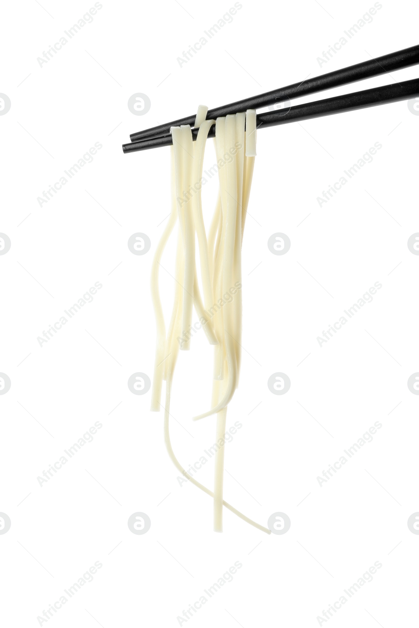 Photo of Chopsticks with tasty cooked rice noodles isolated on white