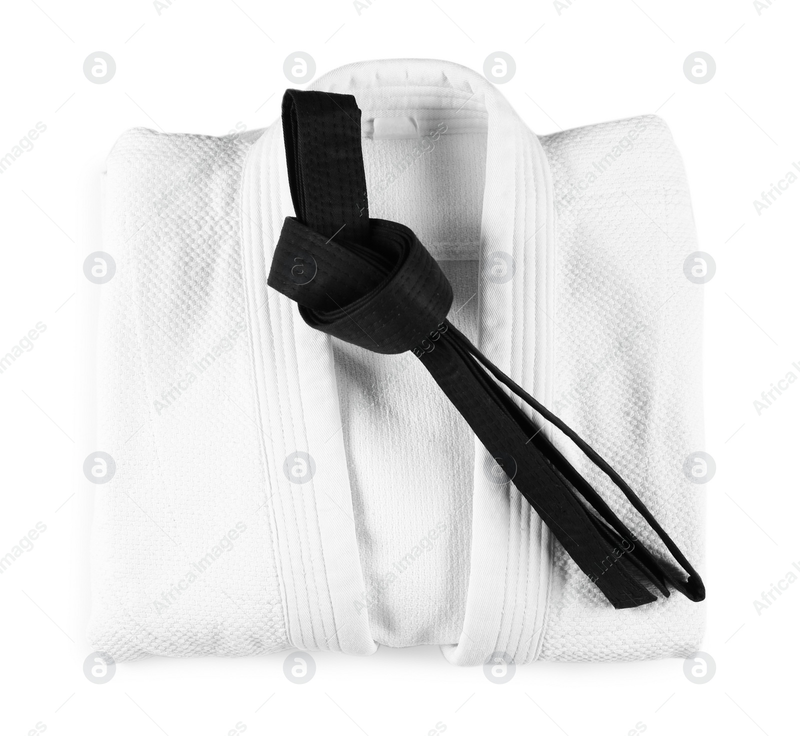 Photo of Martial arts uniform with black belt isolated on white, top view