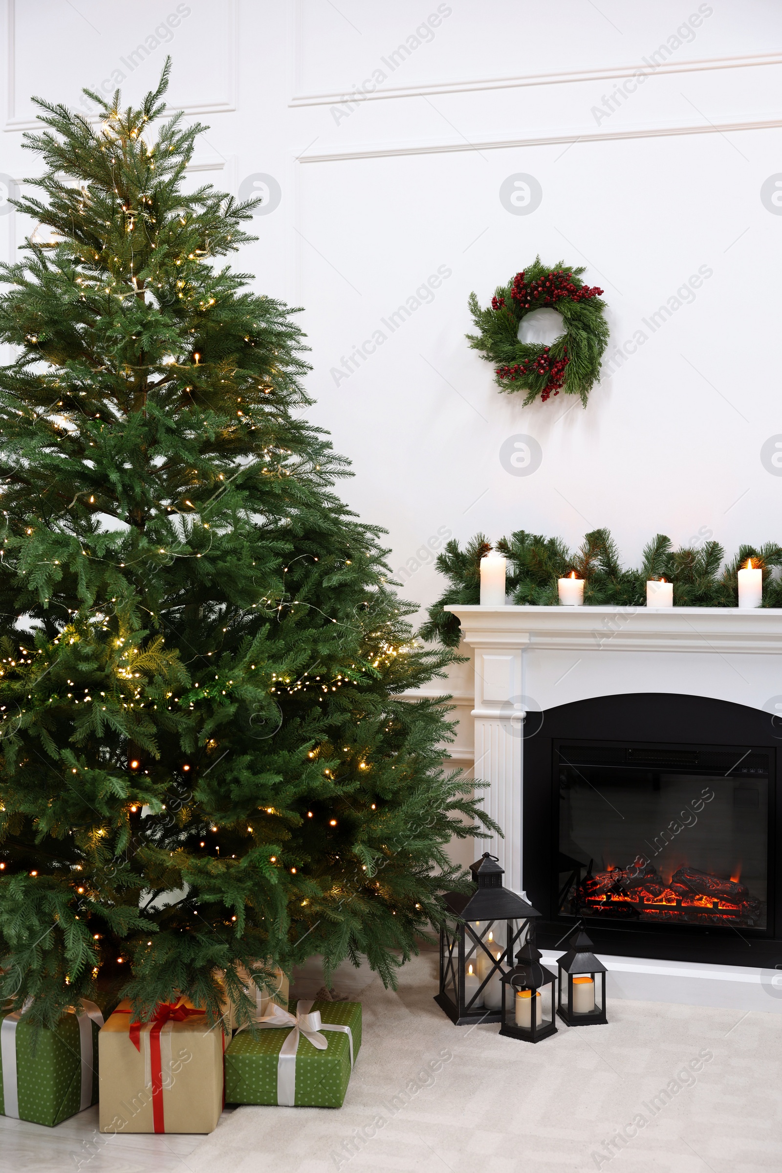 Photo of Beautiful living room interior with decorated Christmas tree