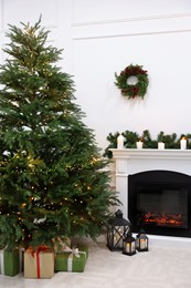 Photo of Beautiful living room interior with decorated Christmas tree