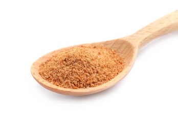 Natural coconut sugar in wooden spoon isolated on white