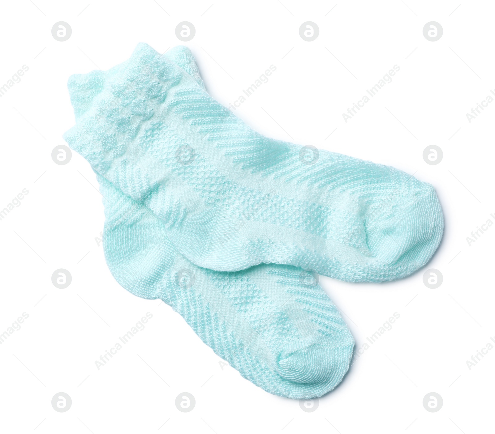 Photo of Cute child socks on white background, top view