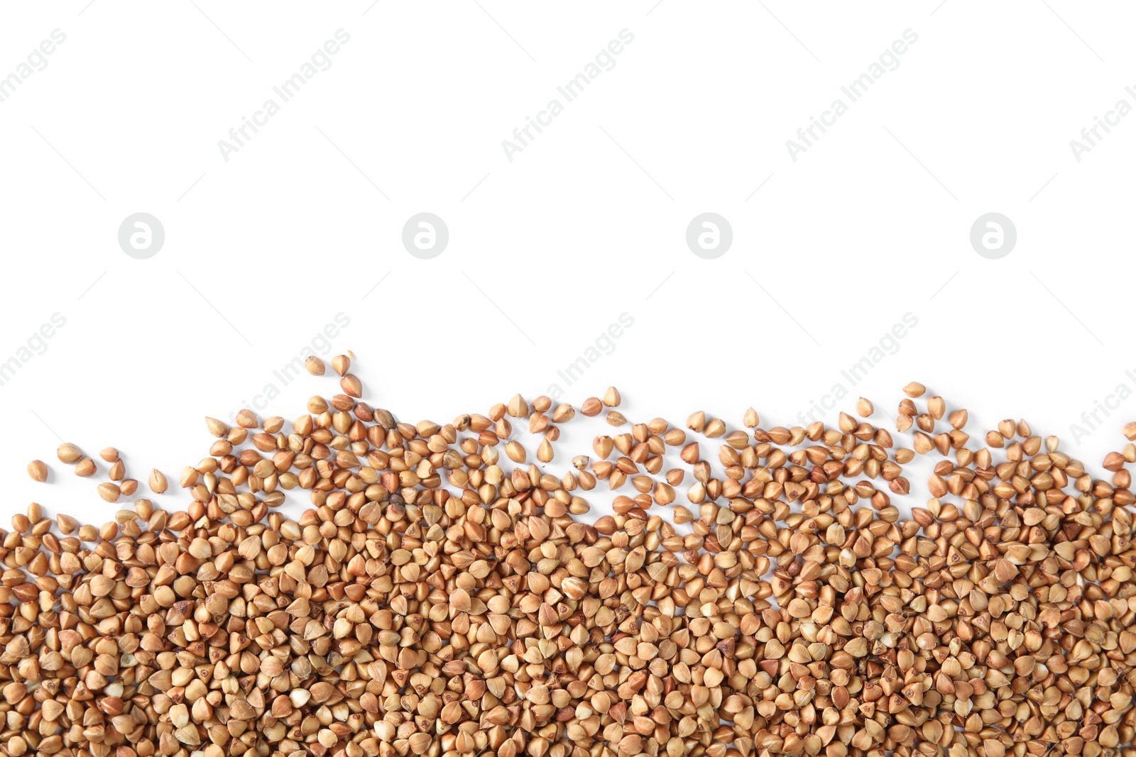 Photo of Uncooked buckwheat on white background, top view