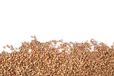 Uncooked buckwheat on white background, top view