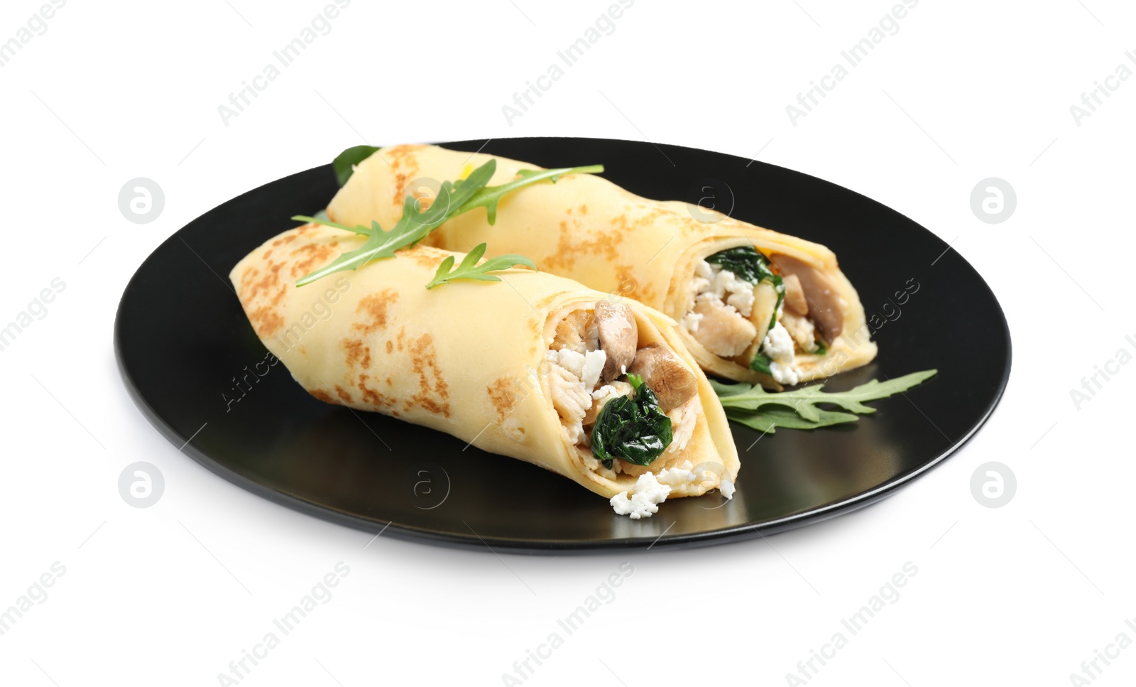 Photo of Delicious thin pancakes with chicken and mushrooms isolated on white