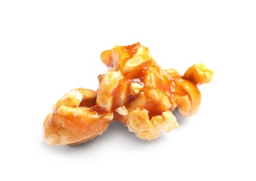 Photo of Delicious caramel popcorn on white background