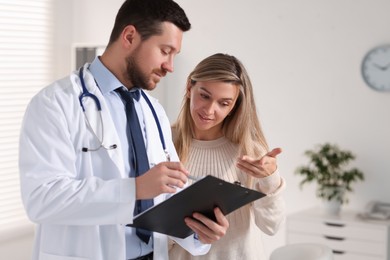 Professional doctor working with patient in hospital