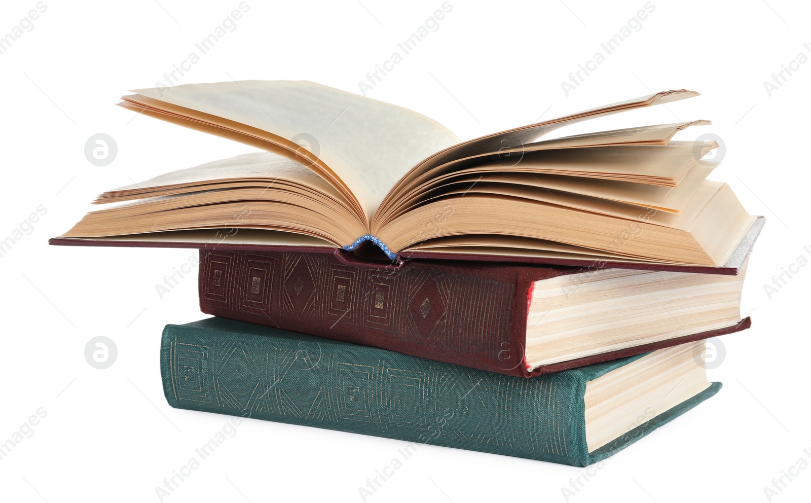 Photo of Many old hardcover books isolated on white