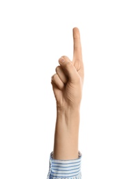 Young woman with raised index finger on white background