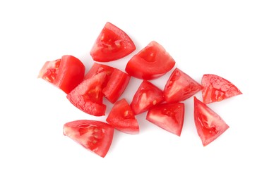 Photo of Pieces of red ripe tomato isolated on white, top view