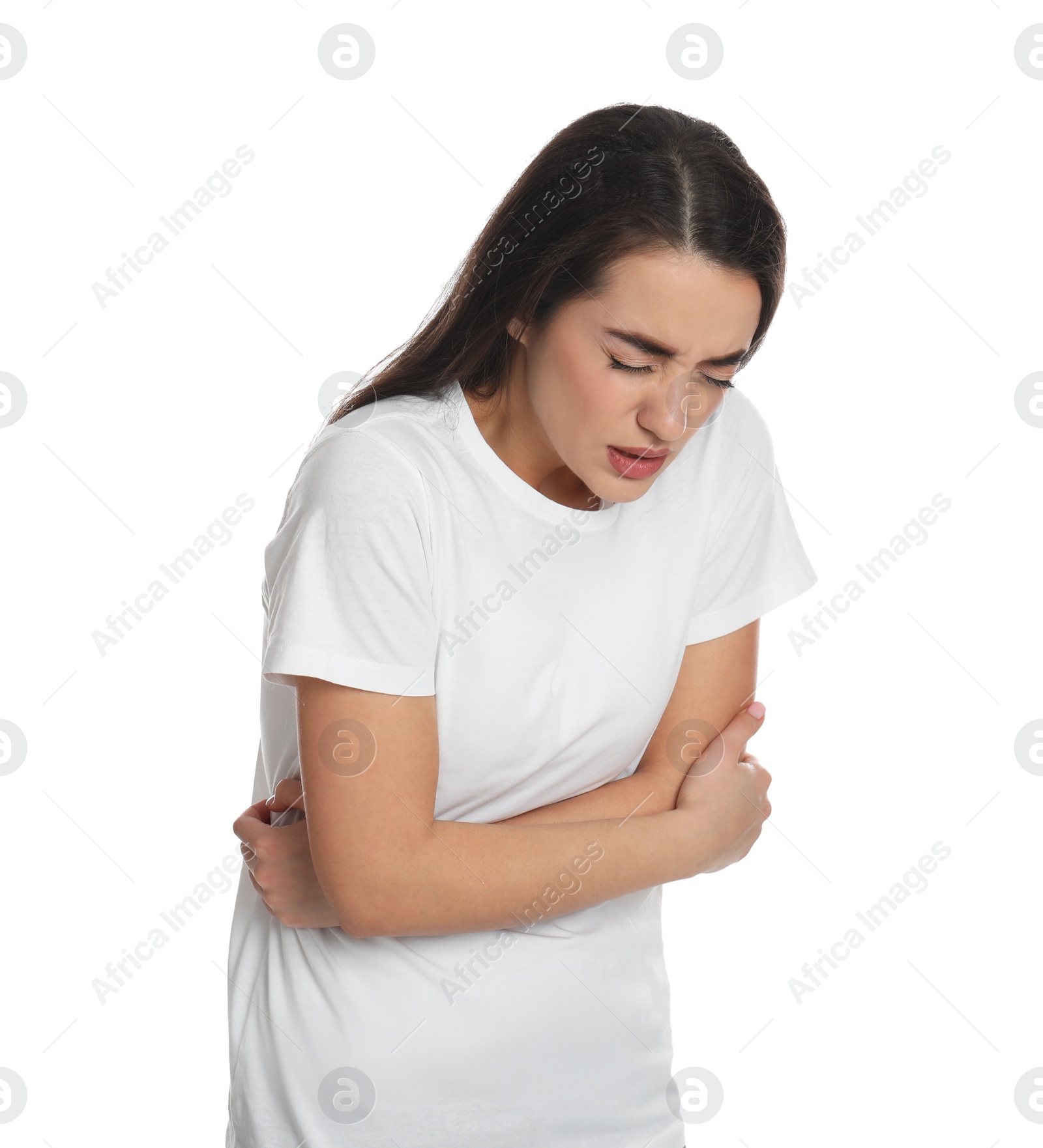 Photo of Young woman suffering from stomach ache on white background. Food poisoning