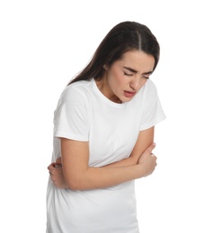 Young woman suffering from stomach ache on white background. Food poisoning